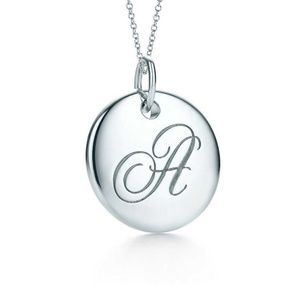 Tiffany & Co Notes Alphabet disc charm pendant